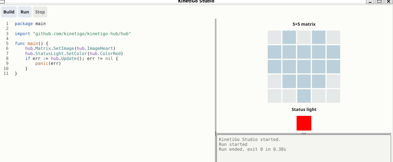 KinetiGo Studio: a Go source editor on the left setting a heart on the matrix and a red status light, and on the right a live preview showing the 5x5 matrix with the heart, the red light, and a console reading Run ended, exit 0 in 0.38s.